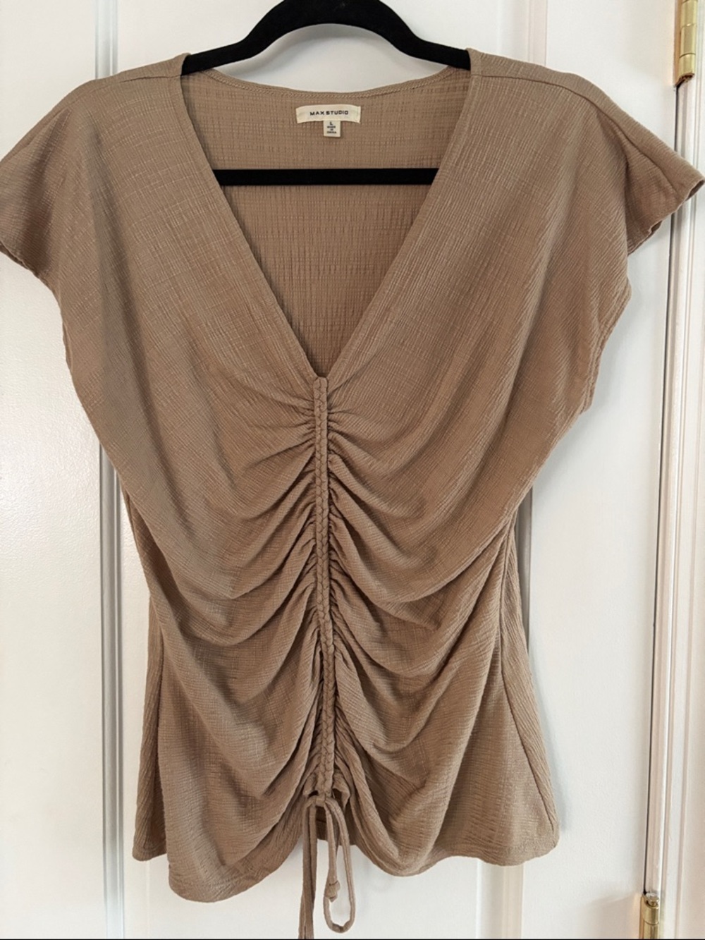 Tan v neck top.